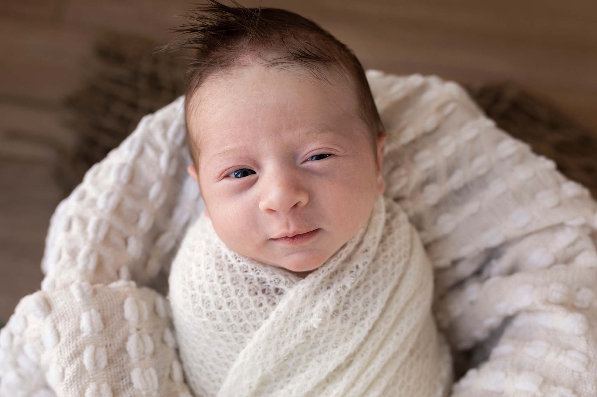 newborn baby with eyes open