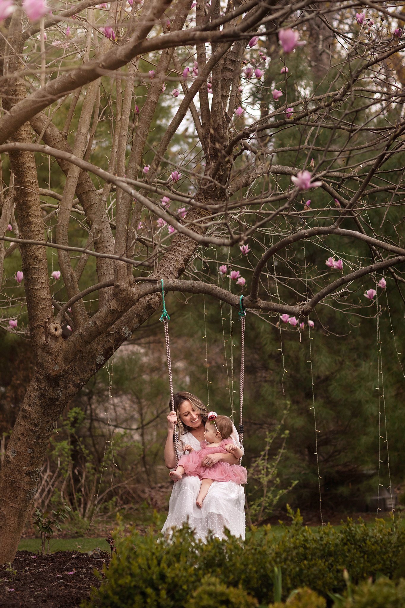 motherhood photography mom and baby on swing