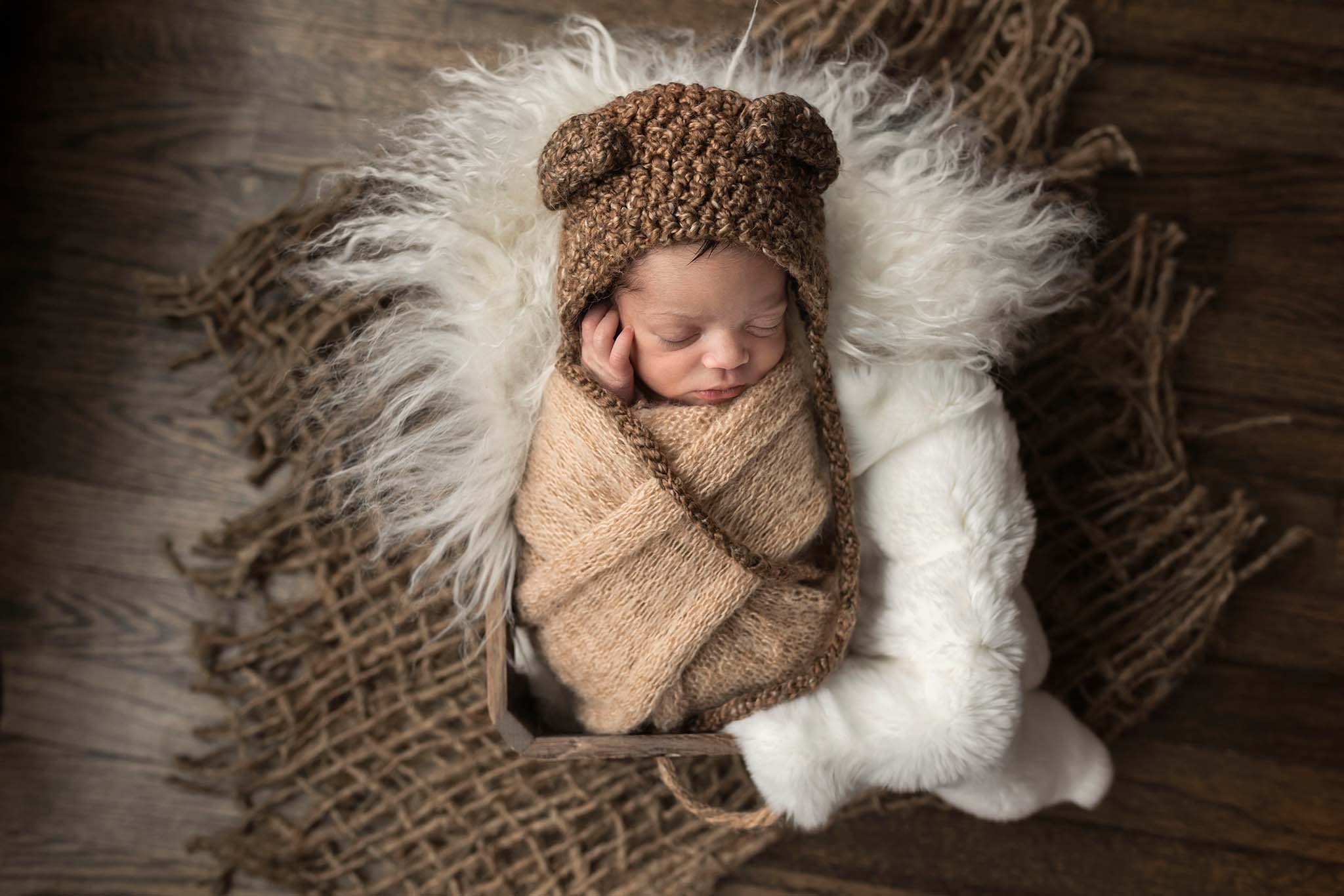 baby in bear hat