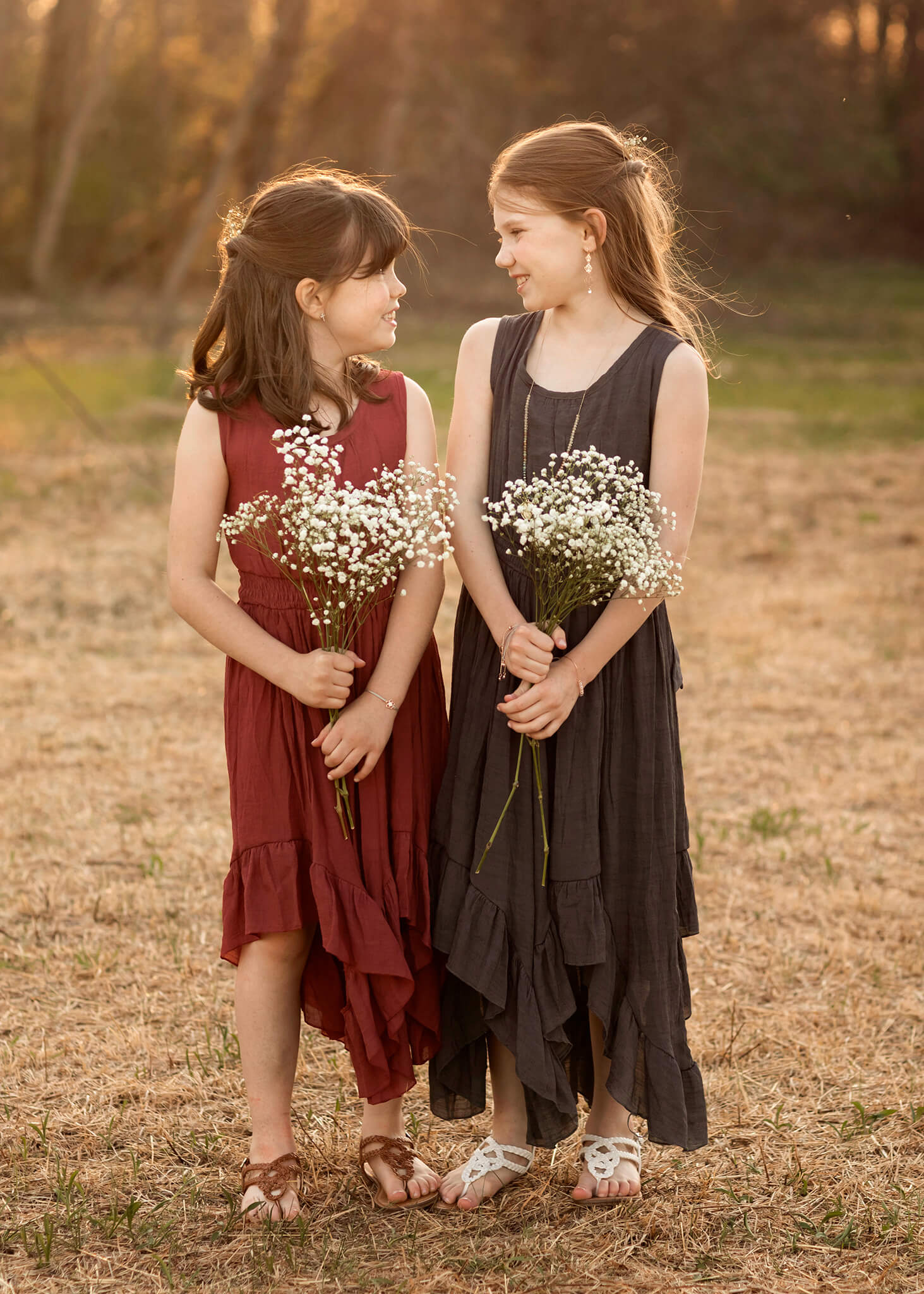 Two sisters with baby's breath flowers