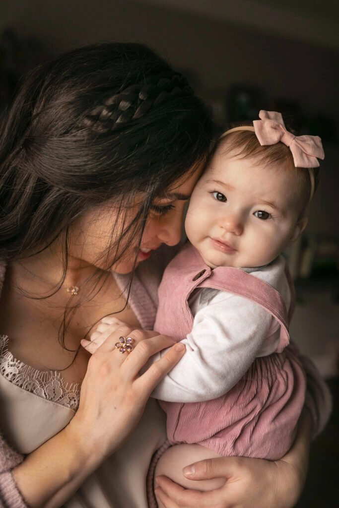Mom holds her daughter close during NJ lifestyle photography session