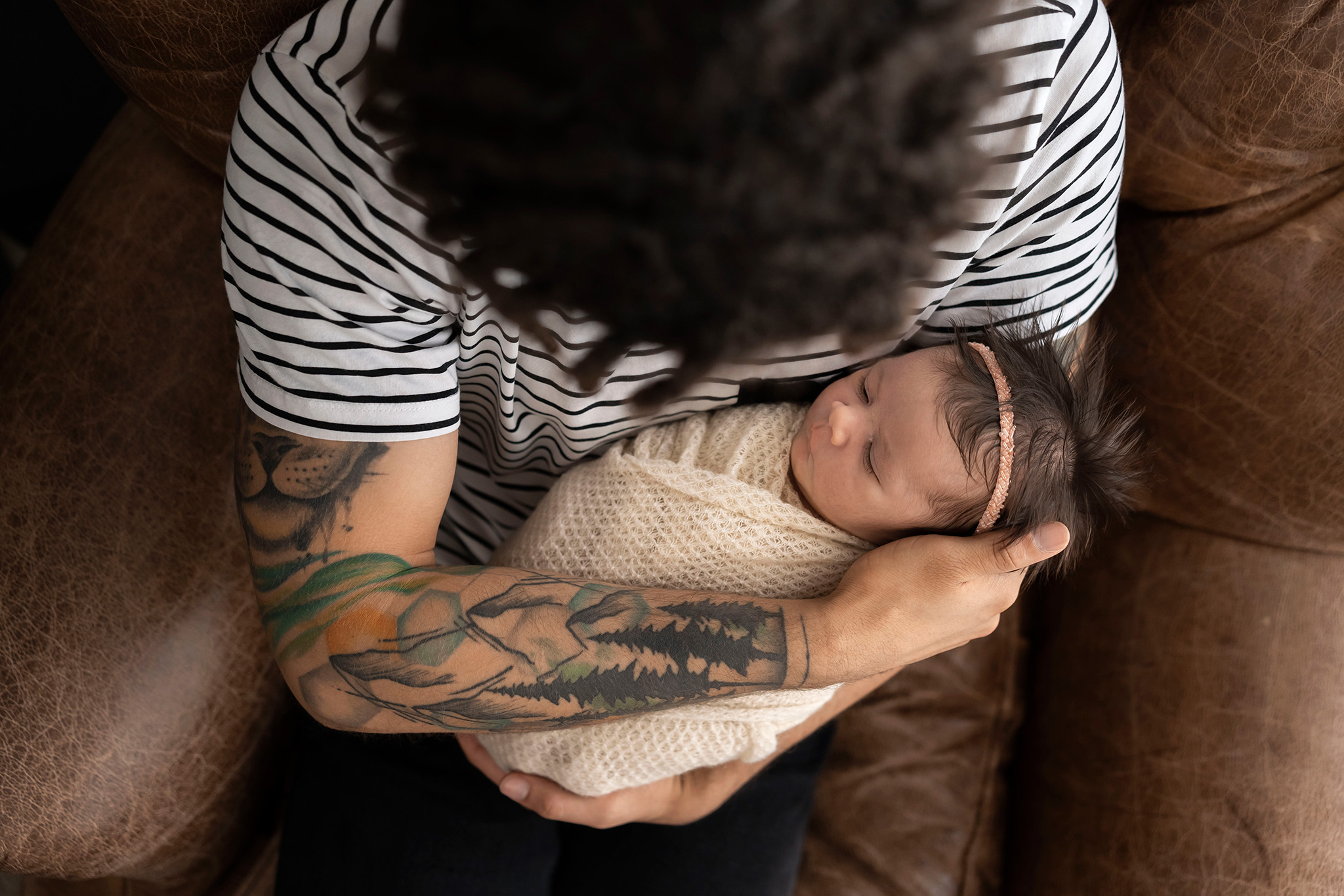 New dad holds his baby girl tightly in his arms I Maternity Photoshoot NJ